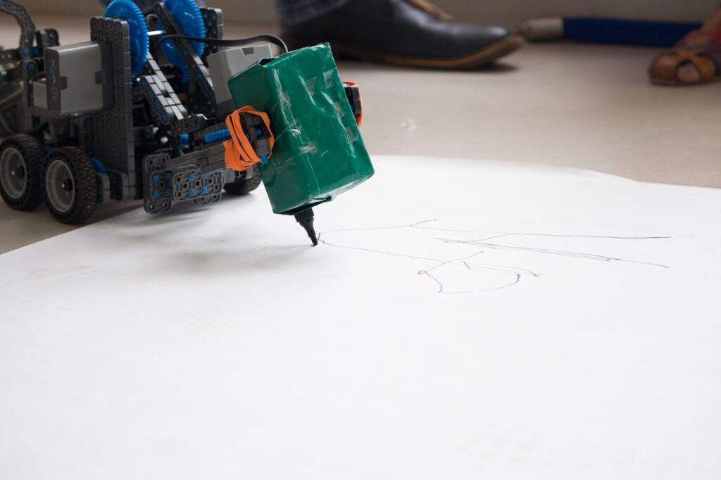Robotic arm with pen